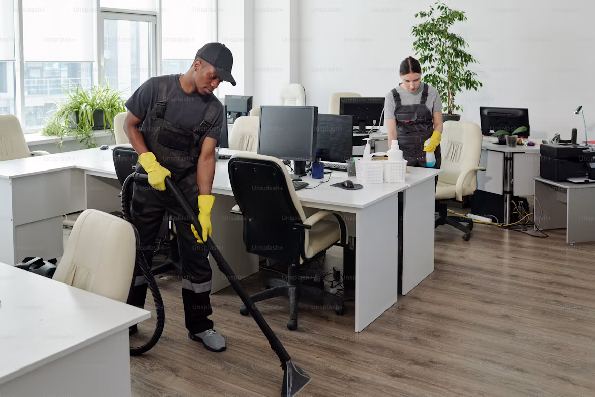 A Colcleaning crew member servicing a building lobby in Philadelphia